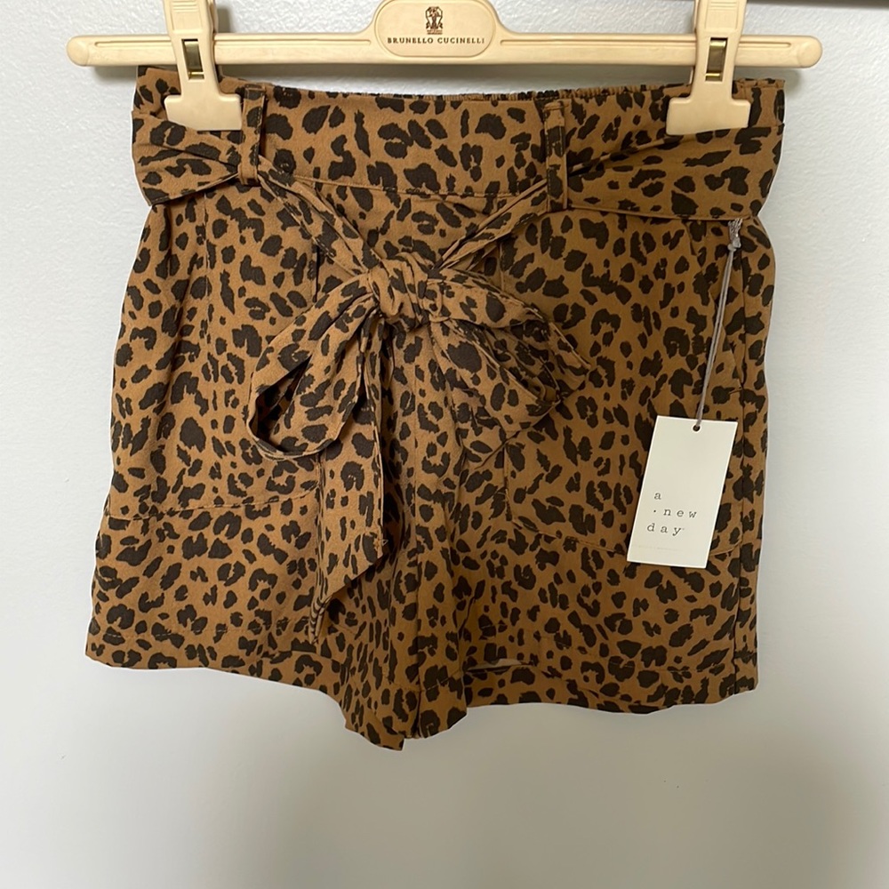 A New Day leopard dressy shorts with 3 inch inseam.